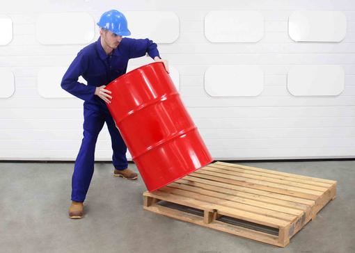 This shows the incorrect way of removing a drum from a pallet.