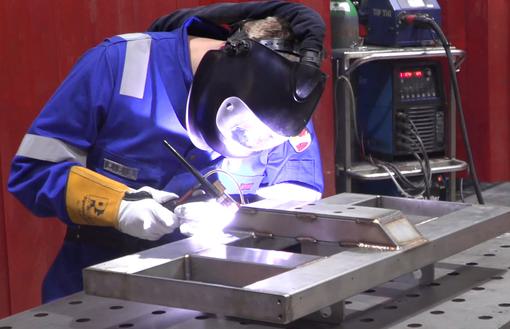 A coded welder fabricates using 304 grade stainless steel.