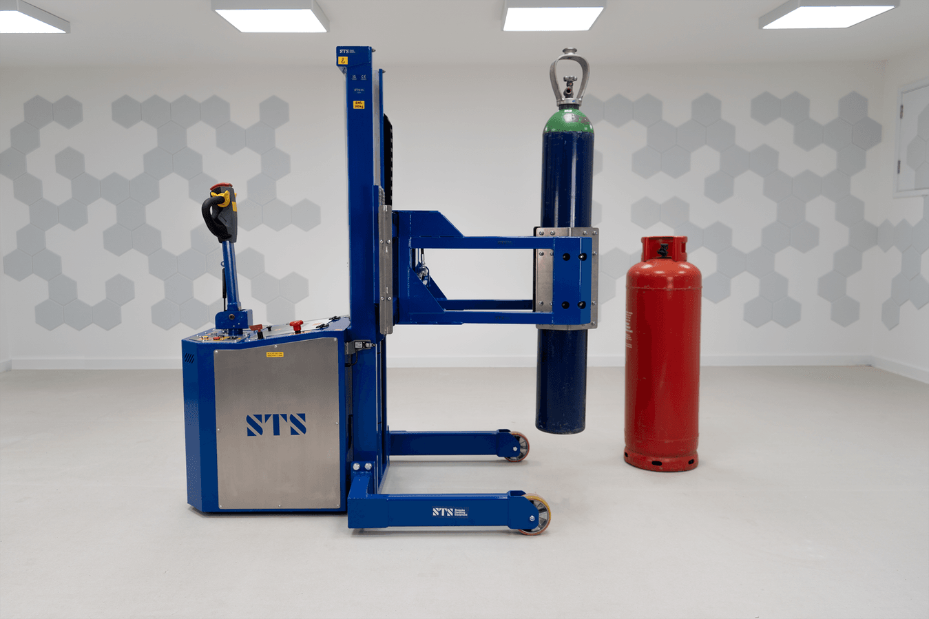 A cylinder handling machine lifting a high pressure gas bottle.
