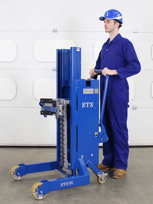 An operator lifting and transporting a heavy gas cylinder with an STS lifter.