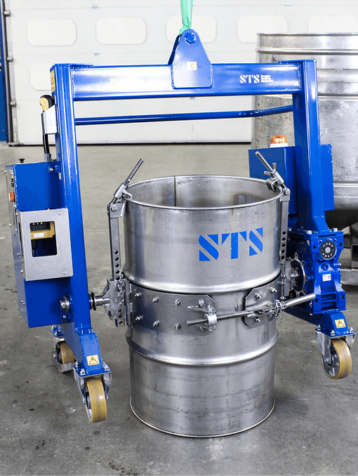DRE05 bespoke drum tipper attatchment with a stainless steel drum secured inside.
