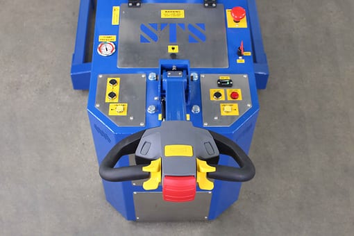 The rear tiller and control panel on a power-driven STS drum handler.