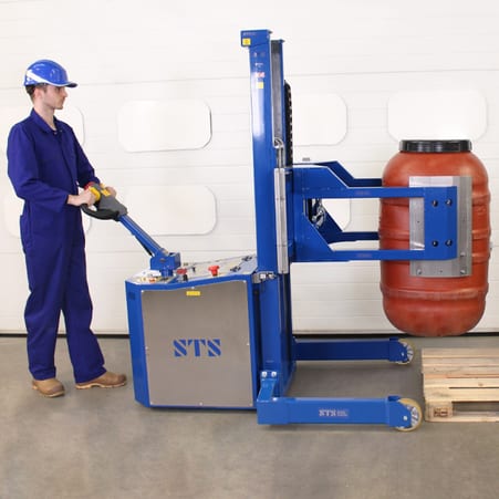 Power Drive Drum Stacker in use loading a barrel onto a pallet