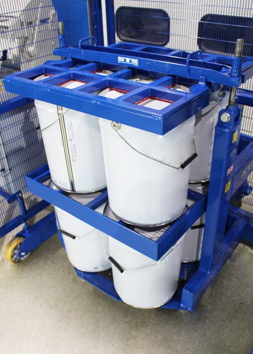 Paint drums secured in the STS paint drum mixer.