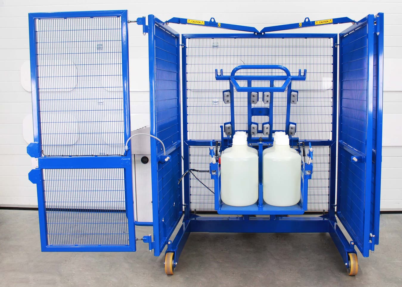 An STS drum mixer loaded with plastic LPDE bottles ready to mix