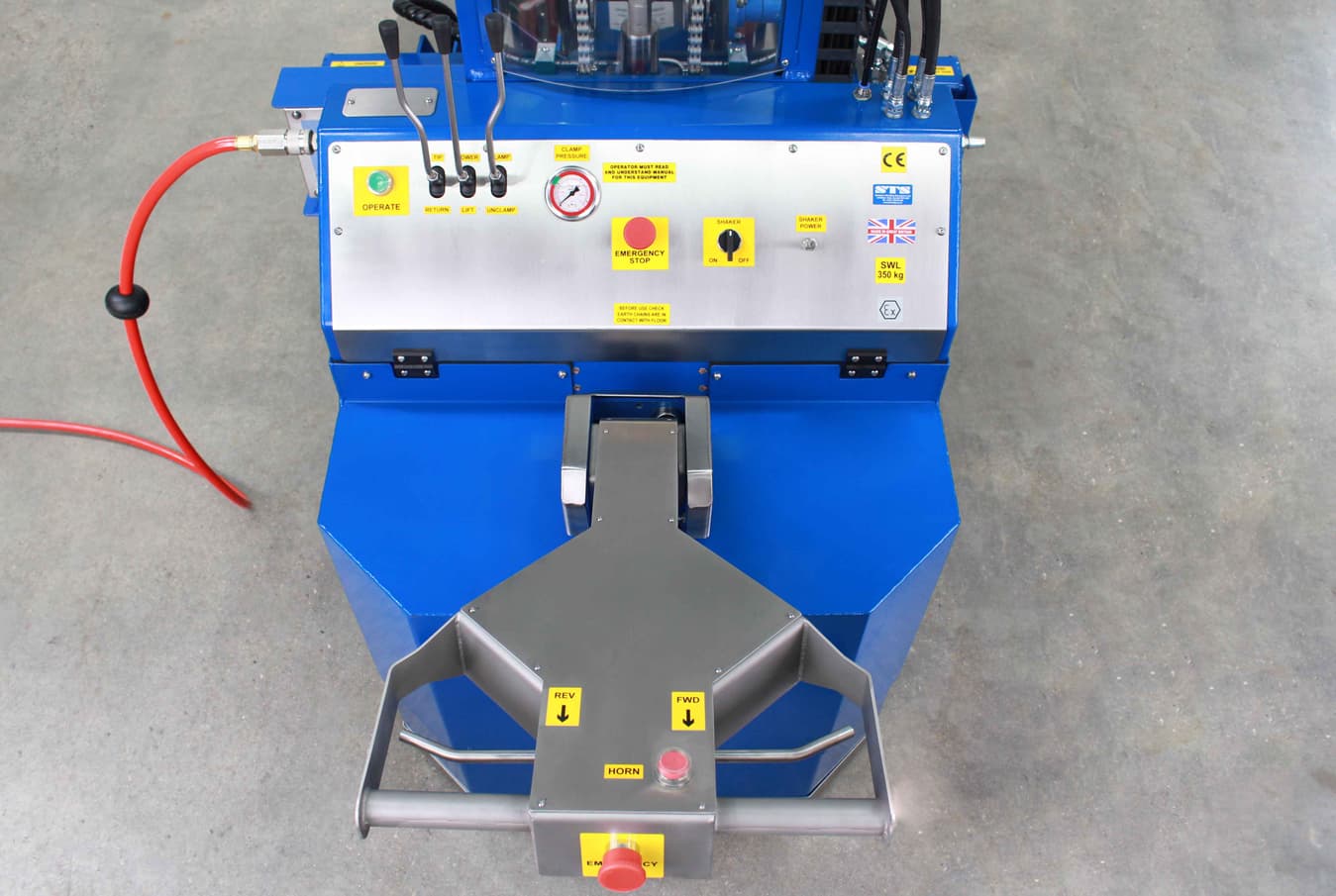 Pneumatic controls features emergency stop and powered lift to rotate and clamp drums