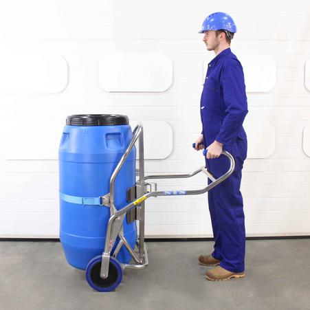 Stainless steel barrel trolley suitable for 350kg drums being used by an operator