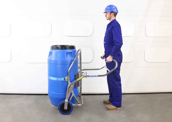 Stainless steel barrel trolley suitable for 350kg drums being used by an operator