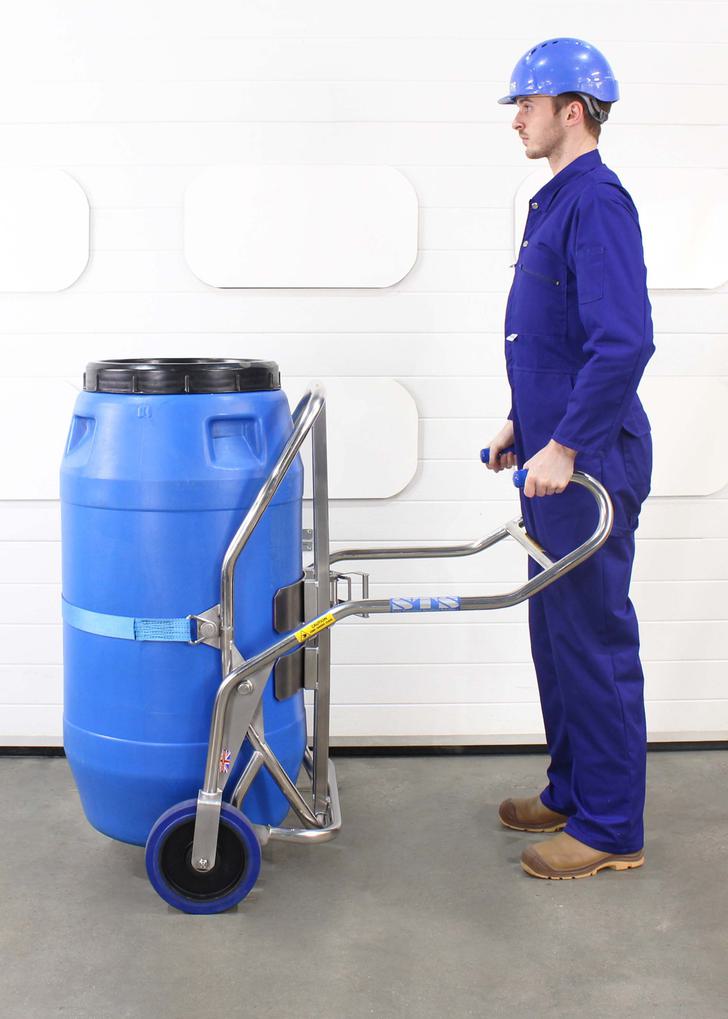 Operator using a barrel trolley to move barrels of up to 350kg