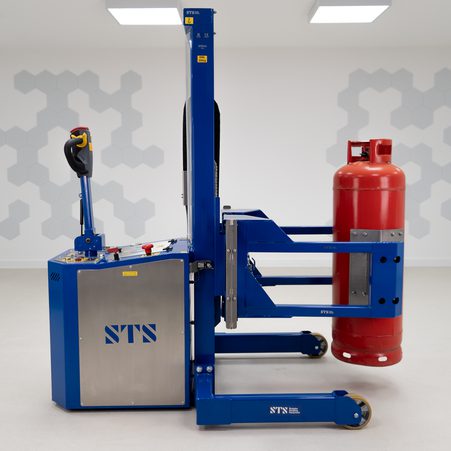 Mechanical gas bottle lifter carrying a red 47kg gas cylinder