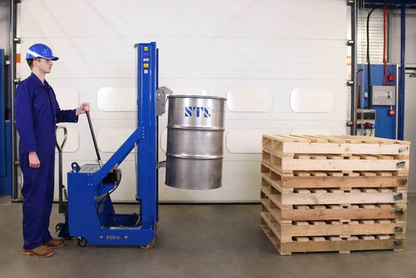 Operator lifts steel open top drum with the tall counterbalance drum lifter.
