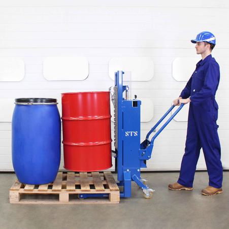 Operator lifts a 200 litre steel drum of water using the Euro Pallet Drum Lifter