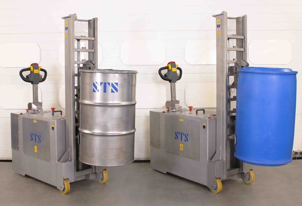 Two stainless steel drum handlers hold 350kg 205 litre drums at height.