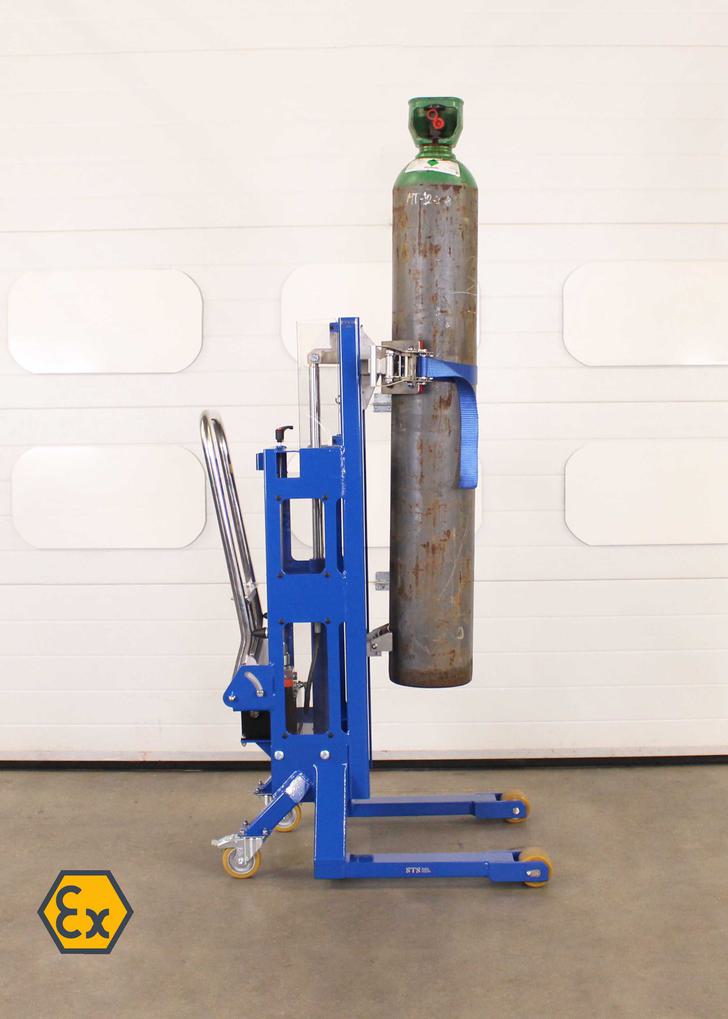 Gas bottle lifter holds a bottle at height in a zoned hazardous area.