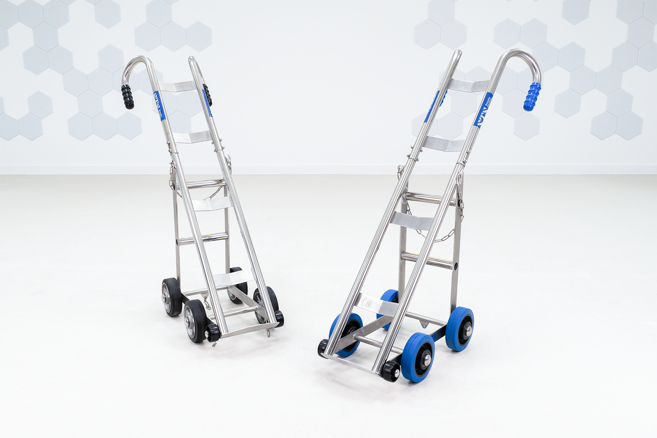 Two stainless steel gas cylinder trolleys, one standard and one ATEX-rated.