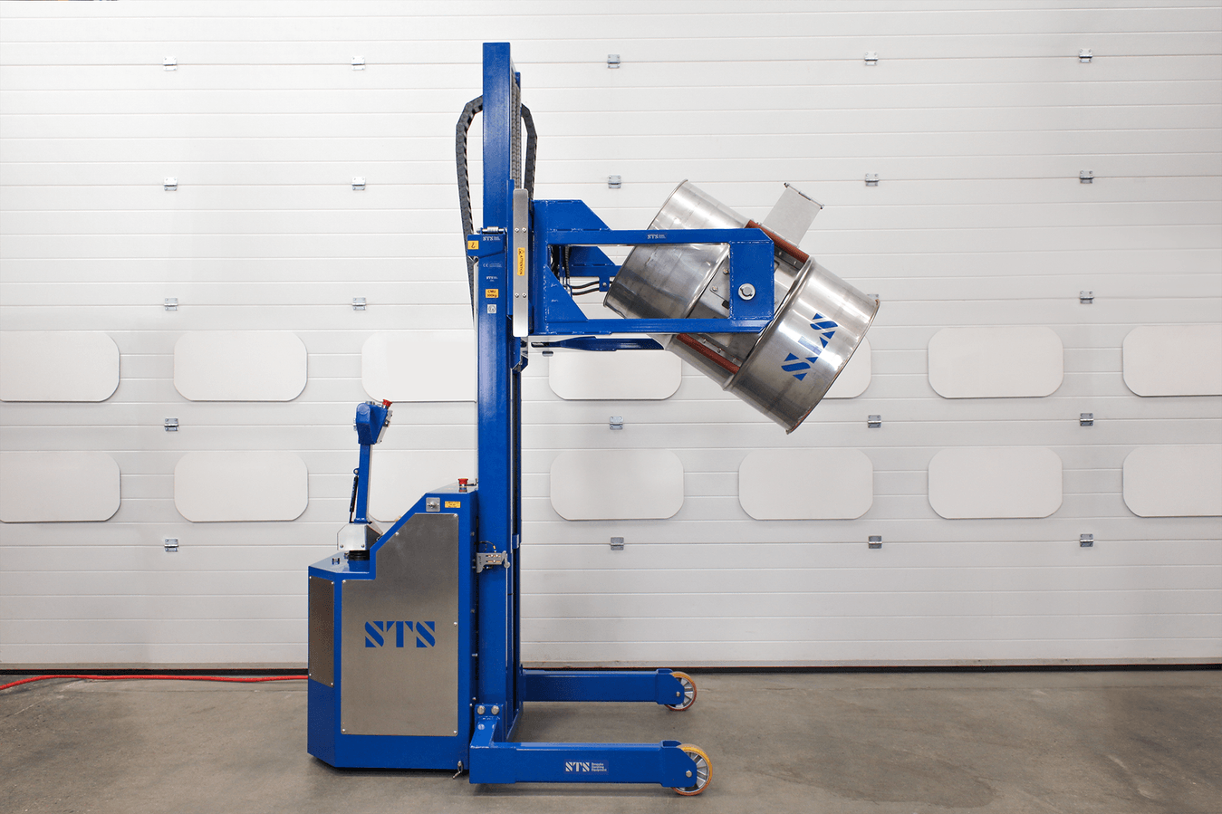 ATEX fully-powered drum tilter rotating a 205 litre steel drum.